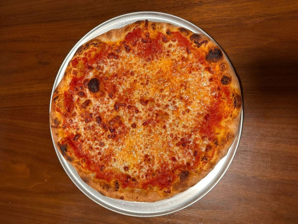 A few NY style pizzas I made last night (cheese + ricotta & hot honey)