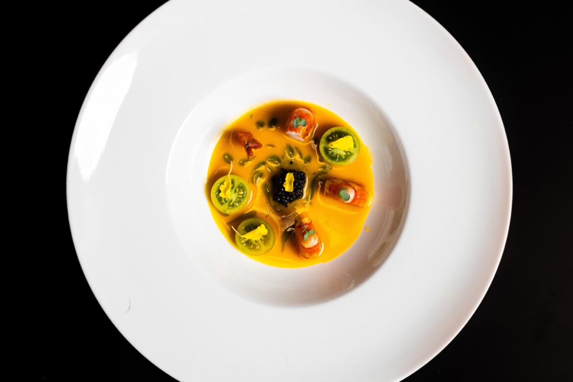 Shrimp, saffron nage, tomato, wild garlic oil, caviar