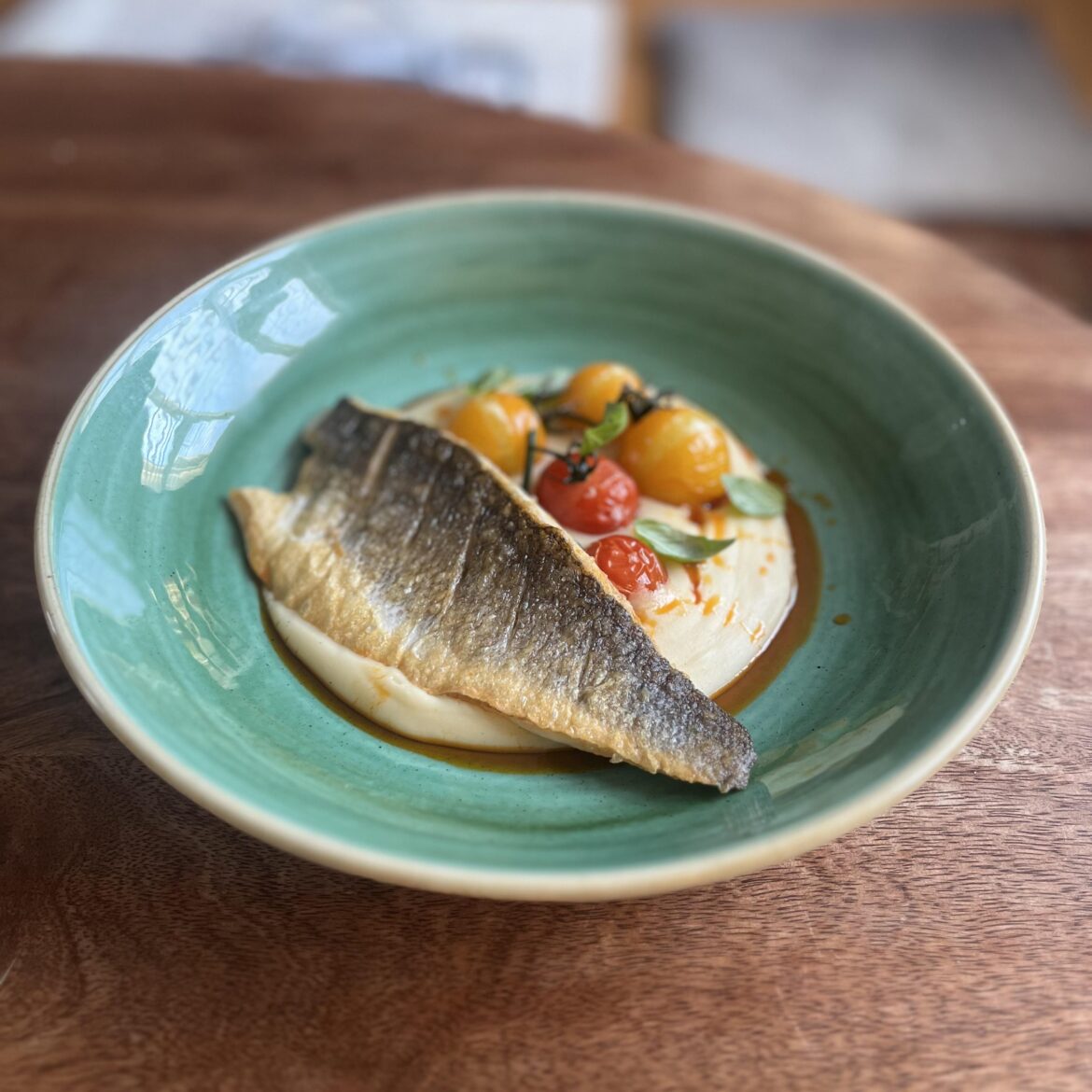 seabass, butterbean purée, cherry tomatoes, nduja oil, basil