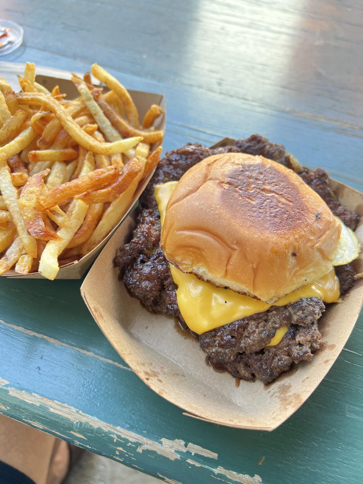 Oklahoma double cheeseburger and fries from Burger She Wrote