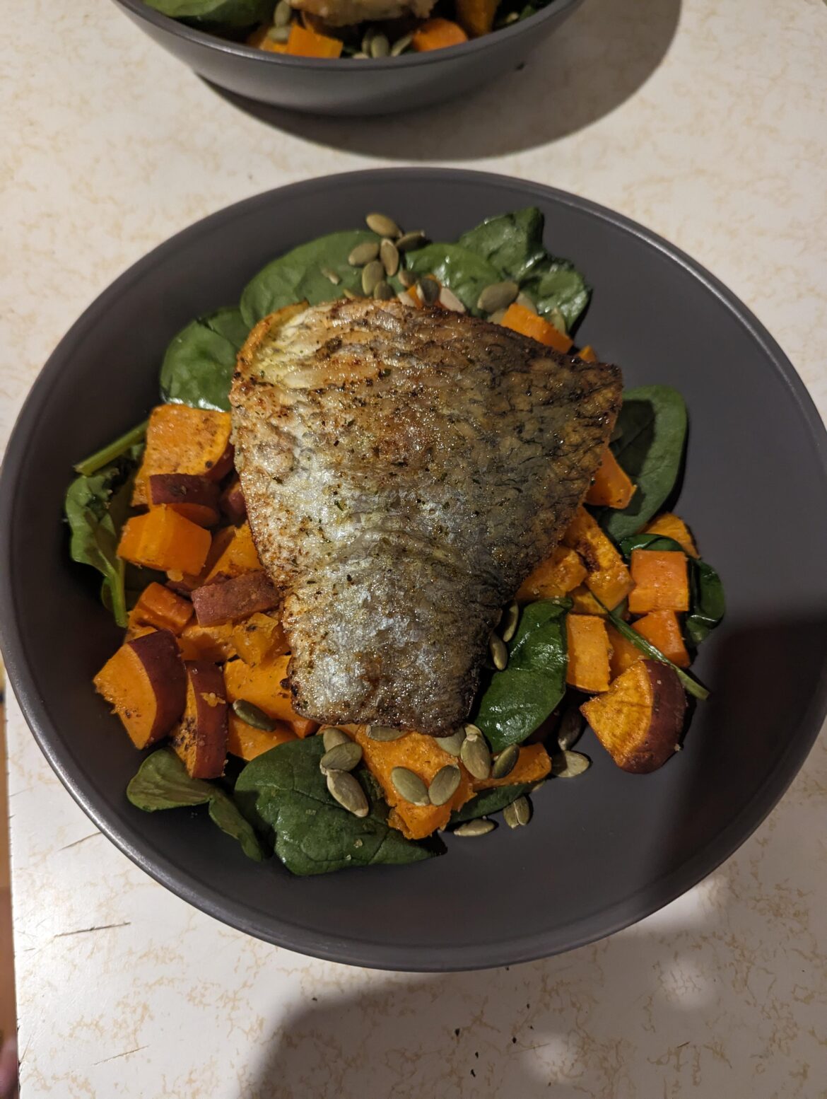 Herb and Garlic Barramundi with Roast Veggie Toss