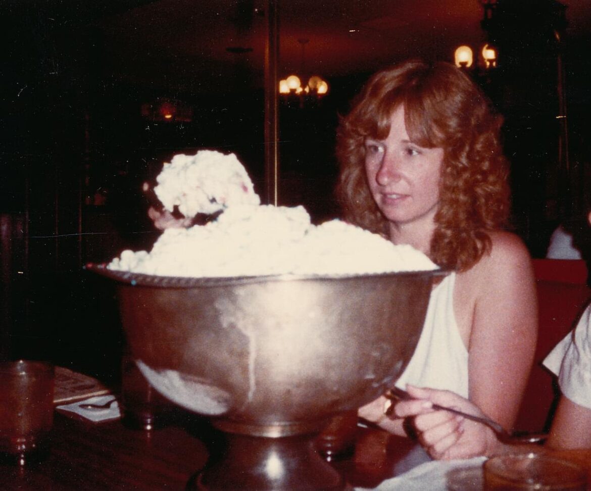Priscilla Adriance Burgers in August ‘82 serving another “scoop” from Jahn’s Ice Cream Parlor’s “Kitchen Sink.” in Fair Lawn, NJ (Located at 41-11 Route 4 West) . For those who never had one, it was a huge concoction comprising as many as 30 scoops of various ice creams, and nearly as many toppings