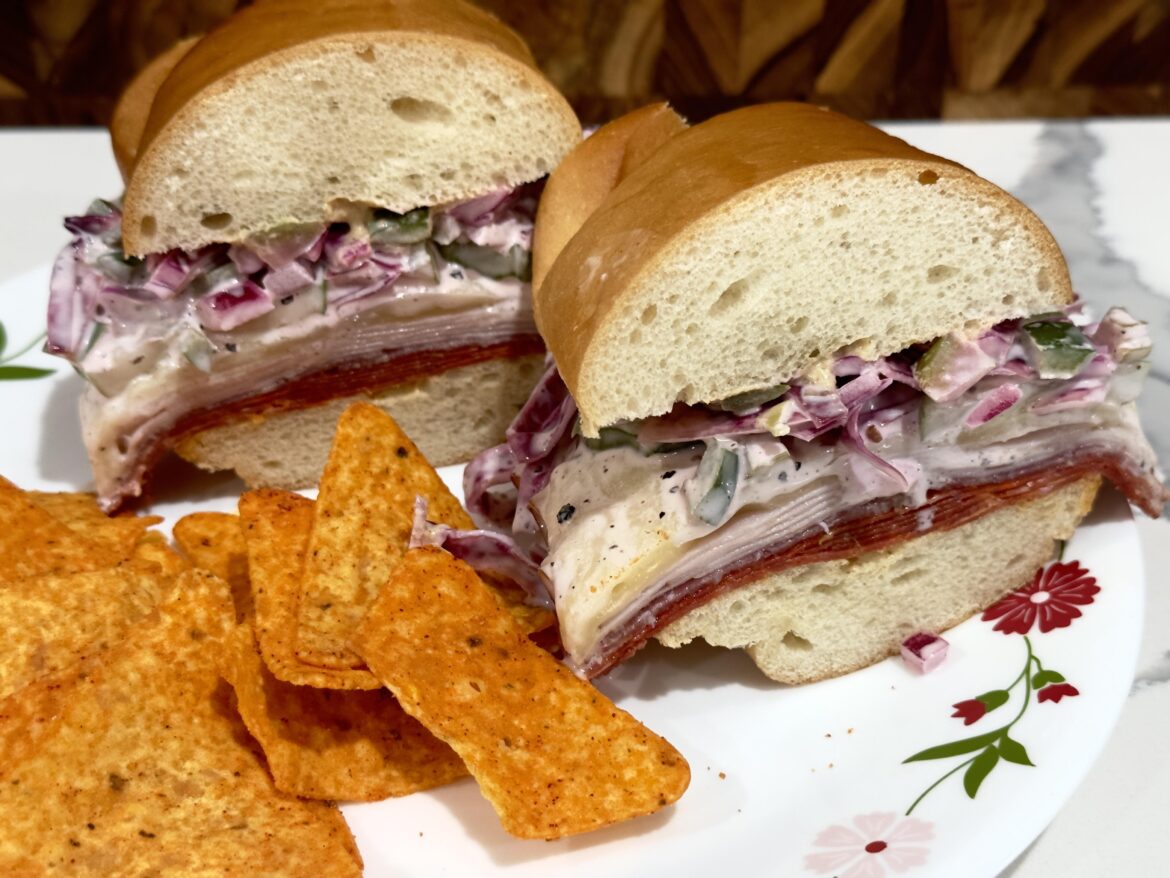 “toasted” pepperoni, salami, turkey and havarti w/ deli mustard, homemade pickles and red cabbage/jalapeño slaw