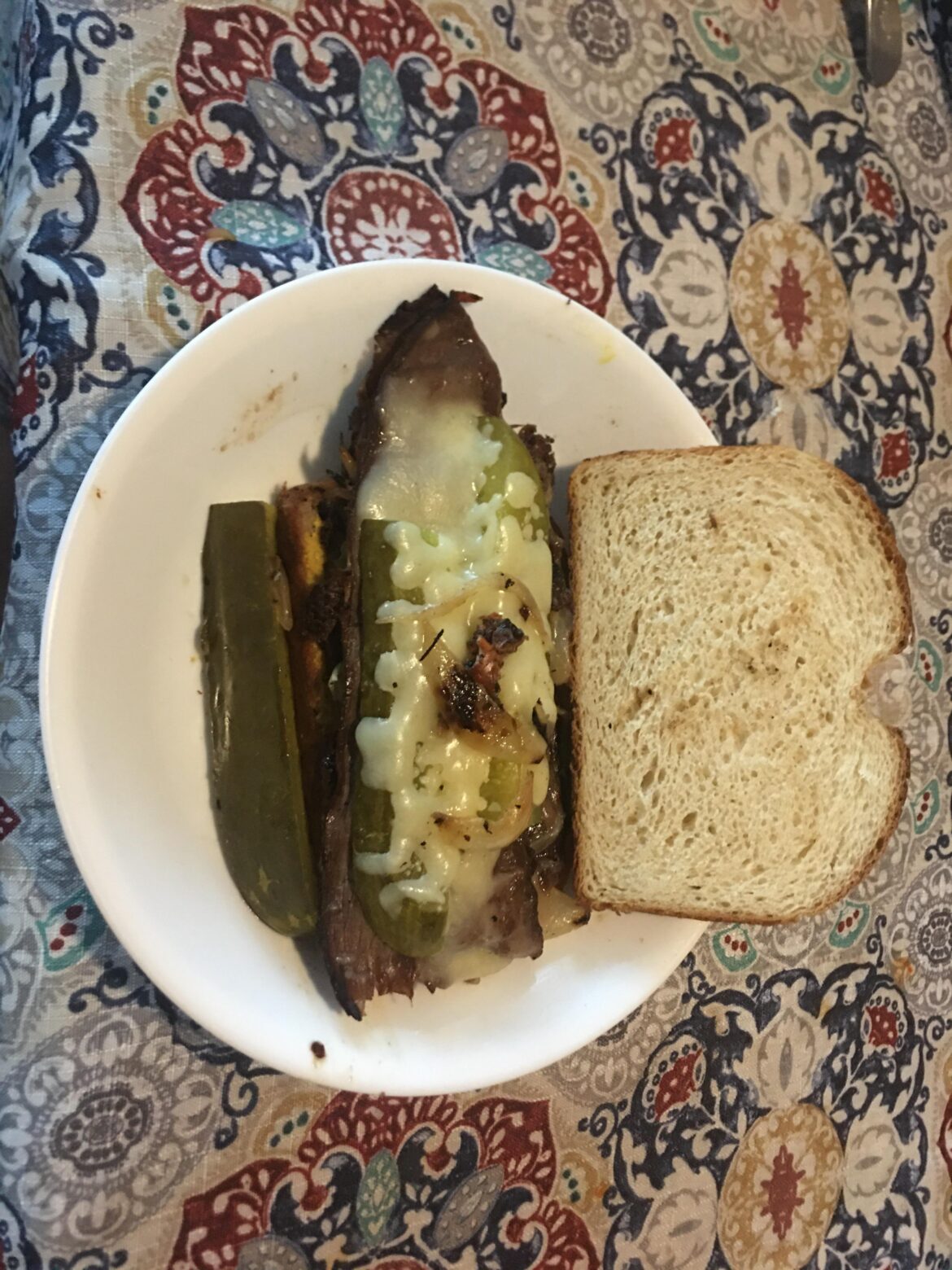 Roast Beef, Pickles, Onions, & Mozzarella on Rye with mustard