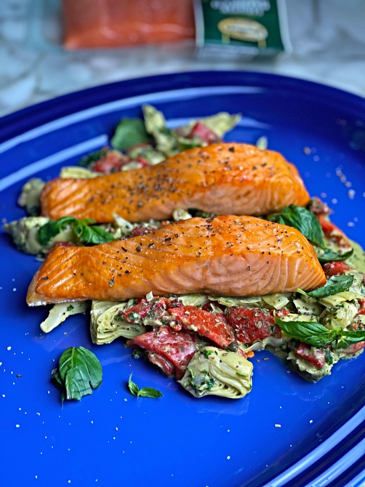 Lightly Smoked Salmon on an Artichoke and Roasted Pepper Salad in Basil Dressing