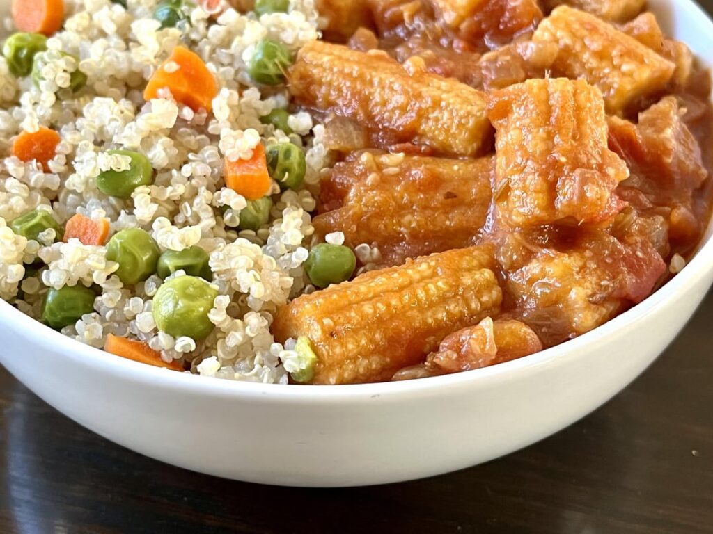 Spiced curry with vegetables and grains.