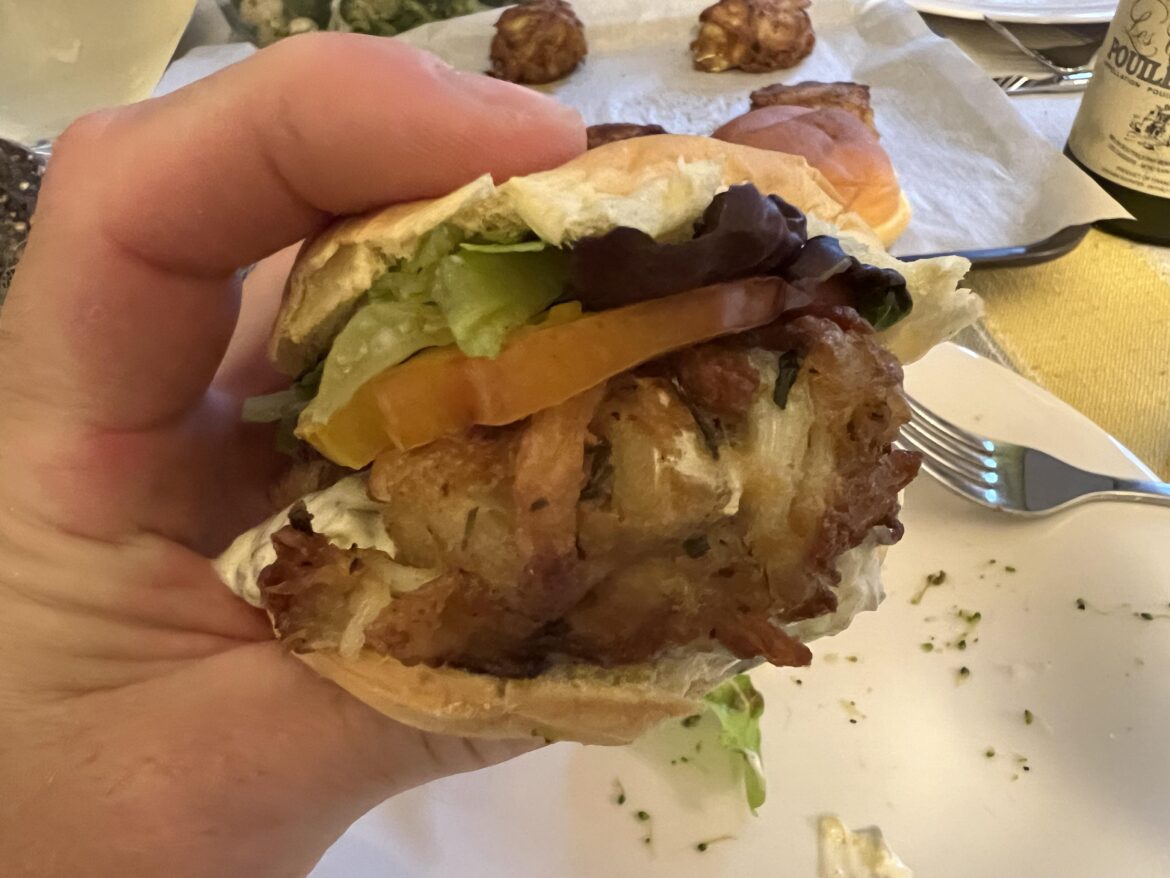 Crab cake sliders from crabs we caught, and tomatoes we grew, on potato roll with tartar and lettuce