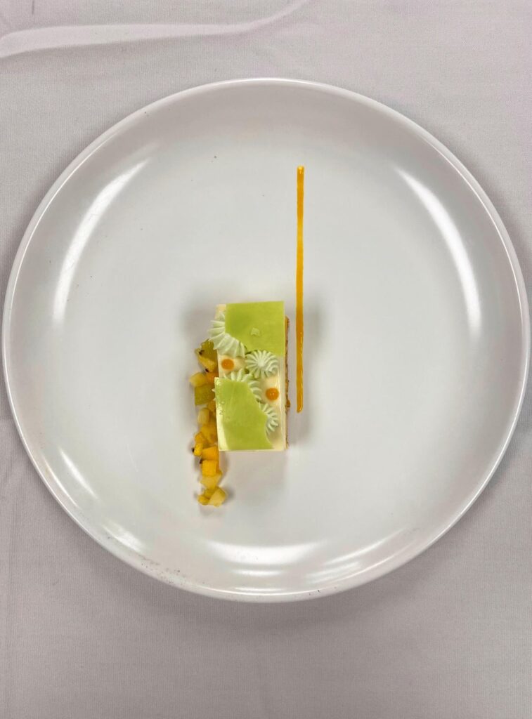 lime cremeux + mango passionfruit coulis + coconut dacquoise + tropical fruit salad + lime creme parisienne