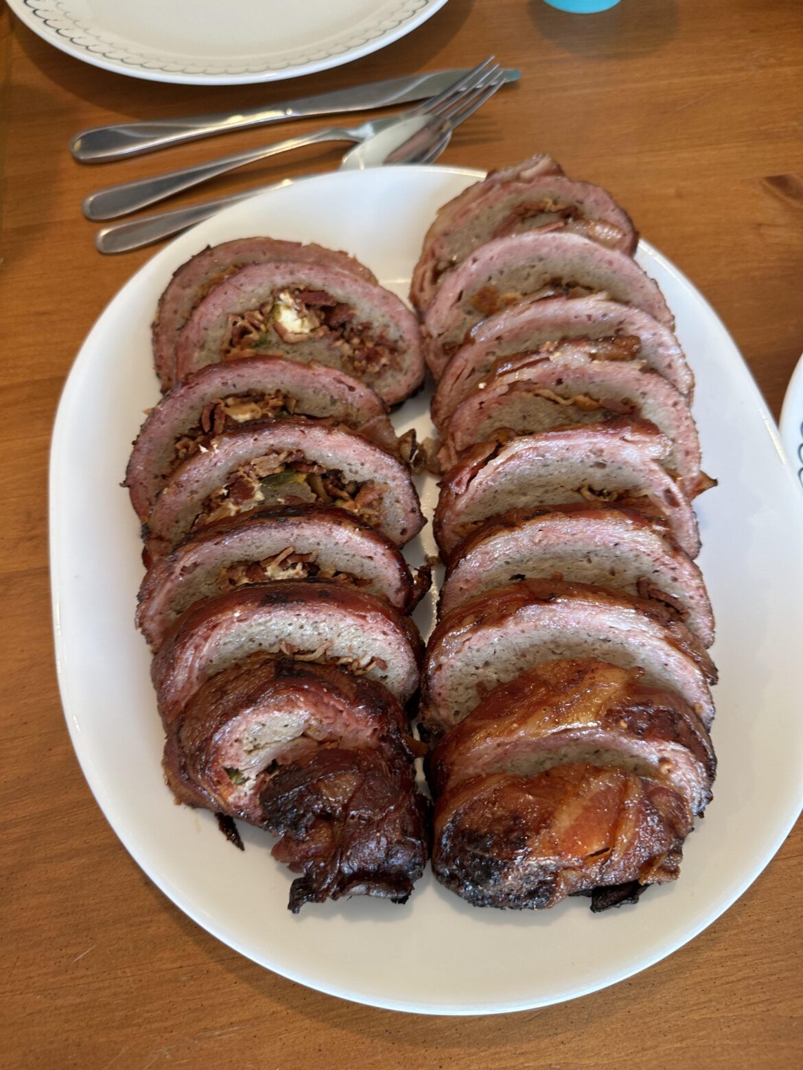 New to the sub. Here’s a recent smoke: Bacon Explosion!