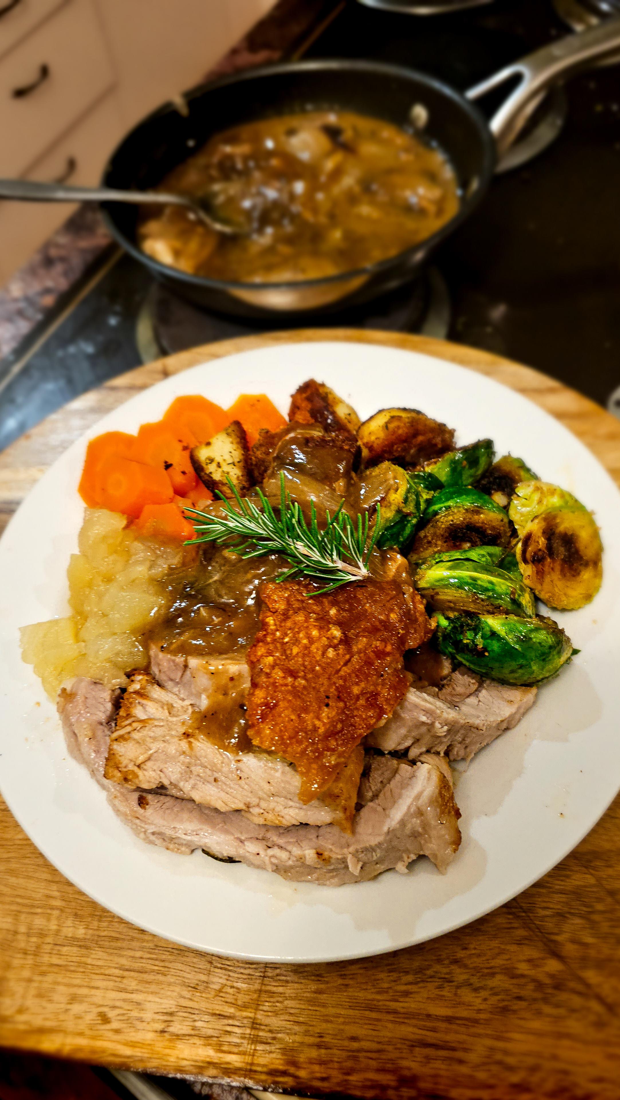 Roast Pork with triple cooked potatoes, brown butter brussel sprouts