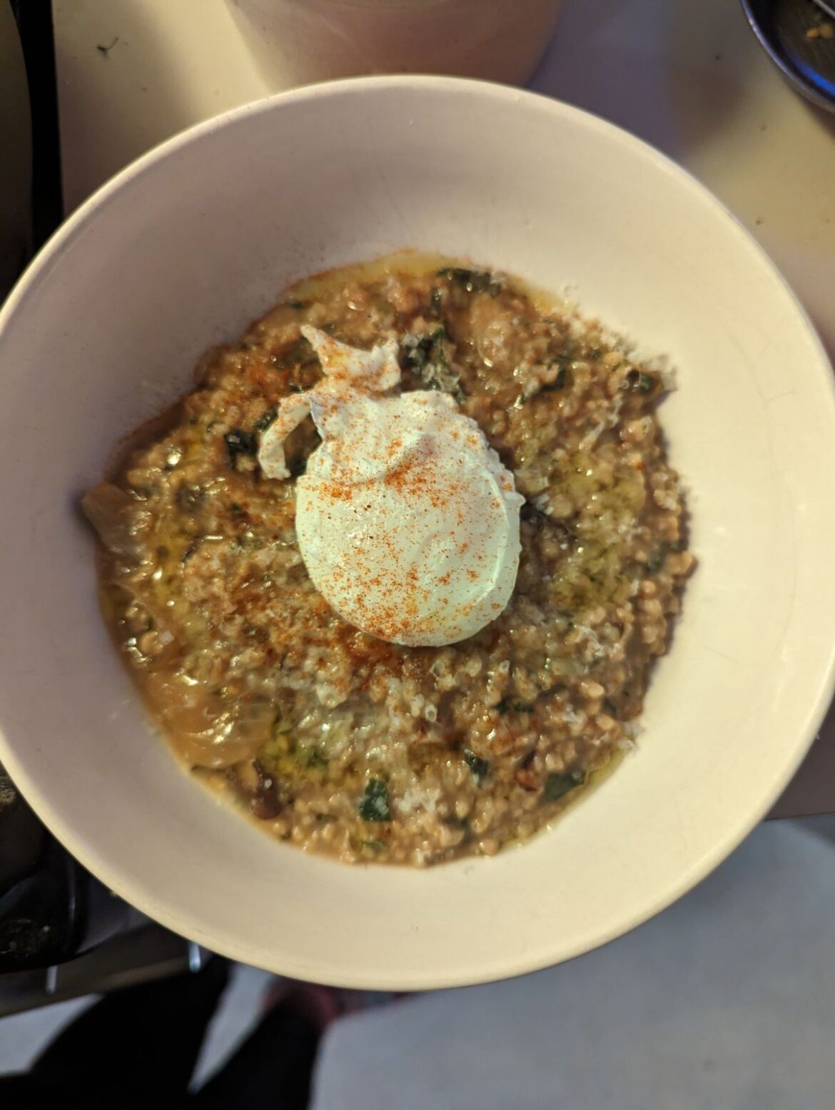 Poached egg on savory mushroom oatmeal
