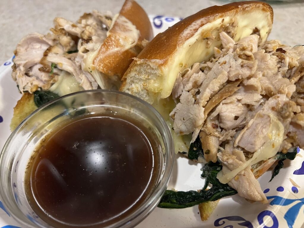 Roast pork, sautéed spinach with garlic, and provolone with a dipping option.