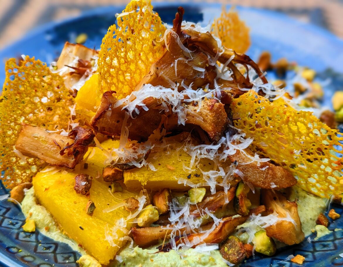Browned butter & pepita purée, roasted maitake, roasted pumpkin, pistachios, grated Parmesan, turmeric tuiles, and lemon juice