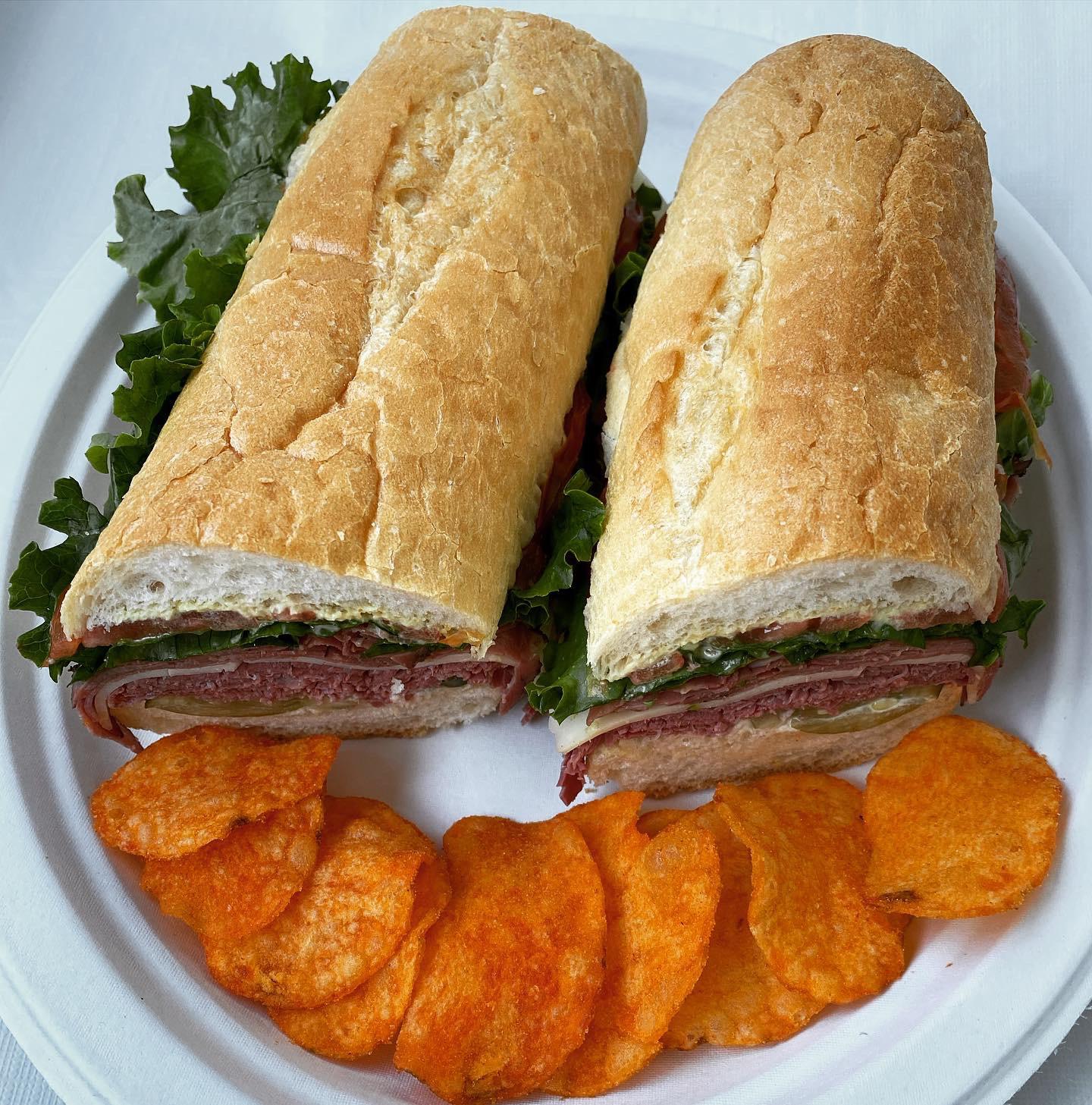 [I ate] A sandwich made with corned beef, pastrami, provolone cheese