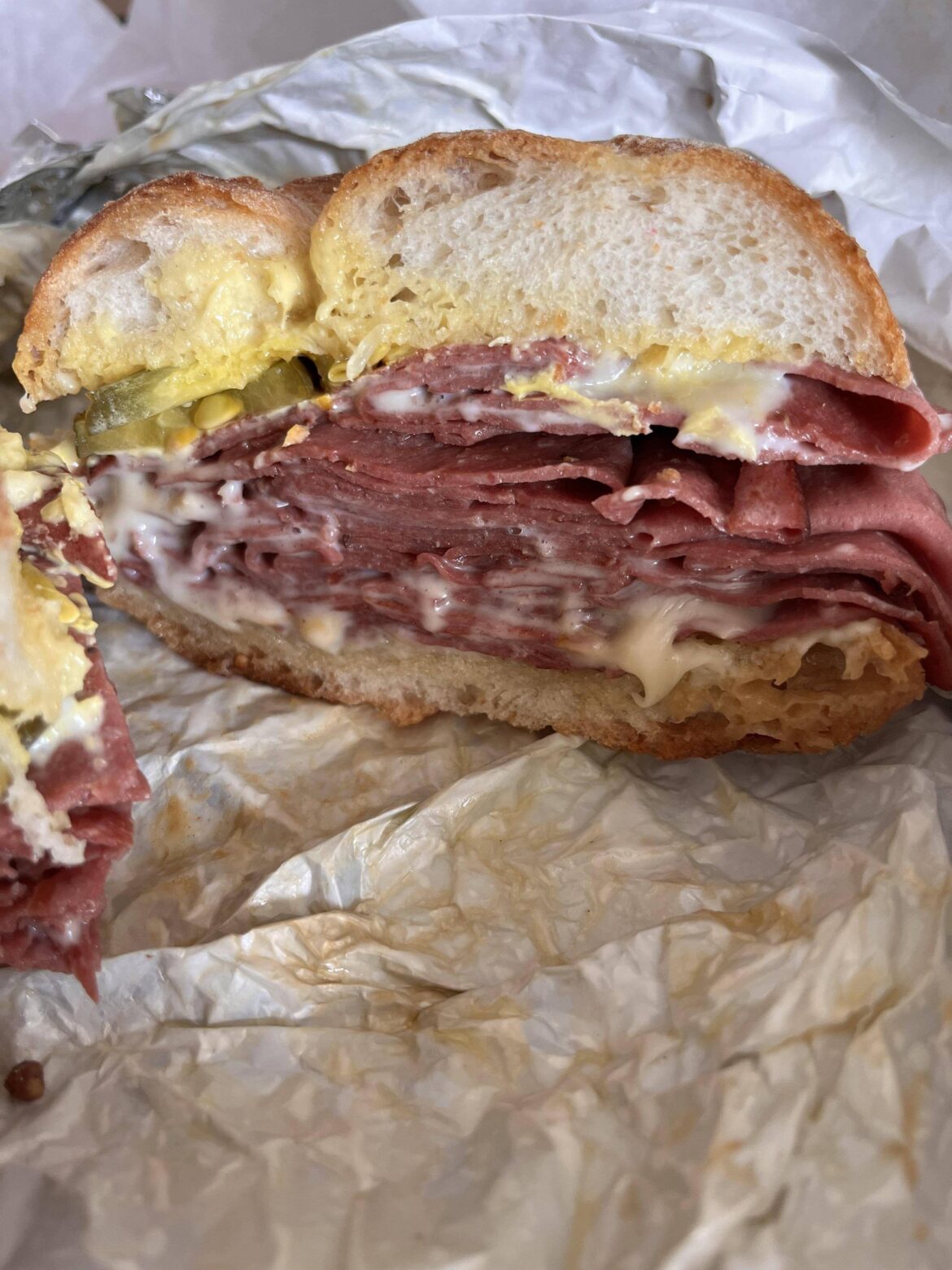 Grilled beef mortadella, American cheese, dill pickles, lemon lime aioli on Rosetta bread from L’industrie Pizza in Brooklyn