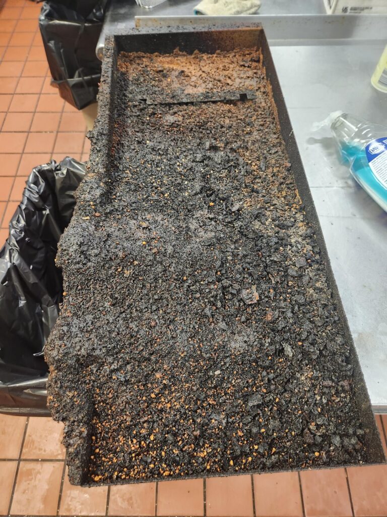 Neglected grease trap. Before and after.