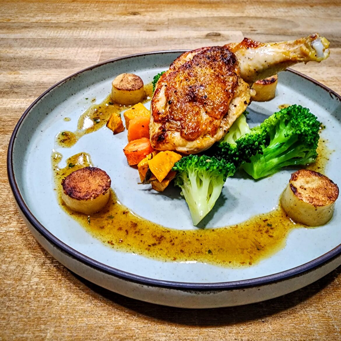 Pan-Seared Airline Chicken, Oven Roasted Vegetables and Fondant Potatoes.