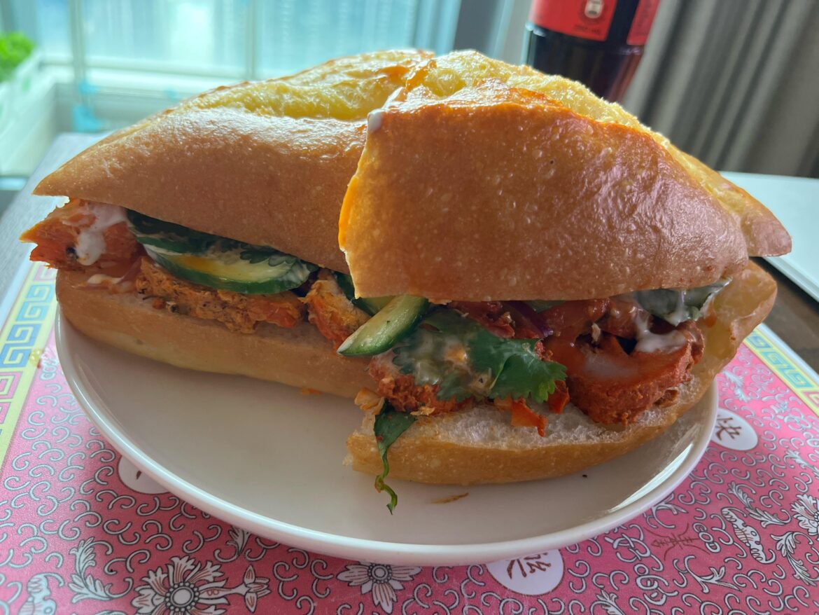 Leftover tandoori chicken, cucumber, cilantro, garlic sauce and sriracha mayo on soft French bread