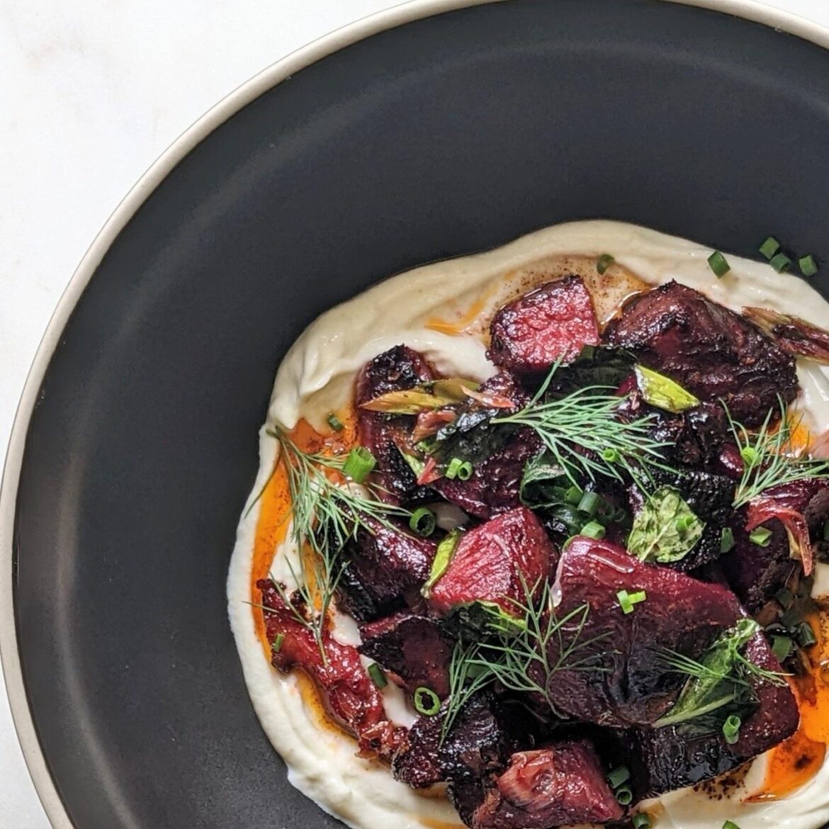 Roasted beets, house pastrami, spices yogurt, Aleppo chili oil, lime, lotsa herbs