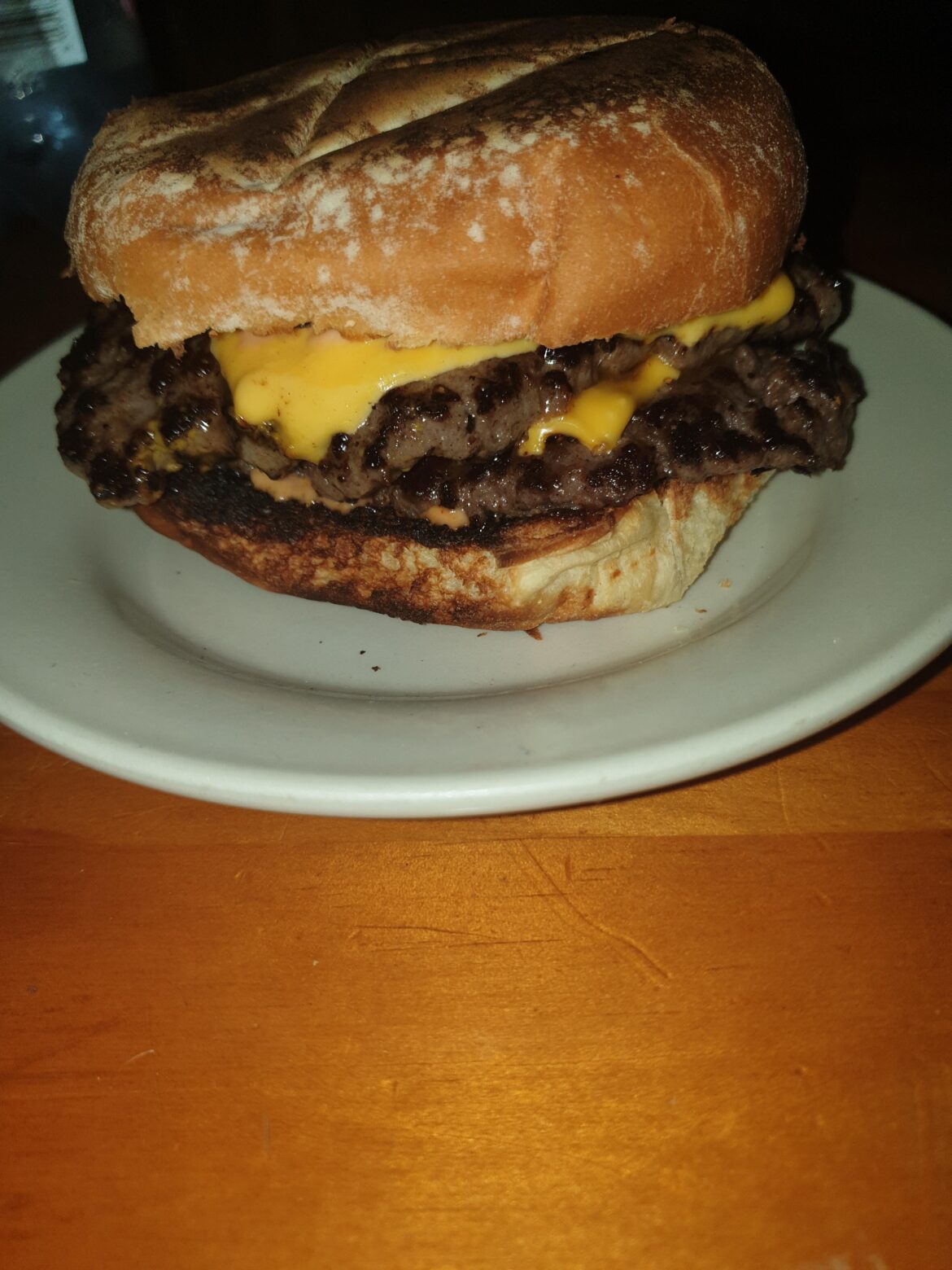 Two Caramelised Onion flavoured patties mustard fried with two slices of American, homemade sauce (ketchup, mayo, dijon mustard, black pepper, paprika, chopped onion and pickles and pickles juice) on some floury baps. Heaven!