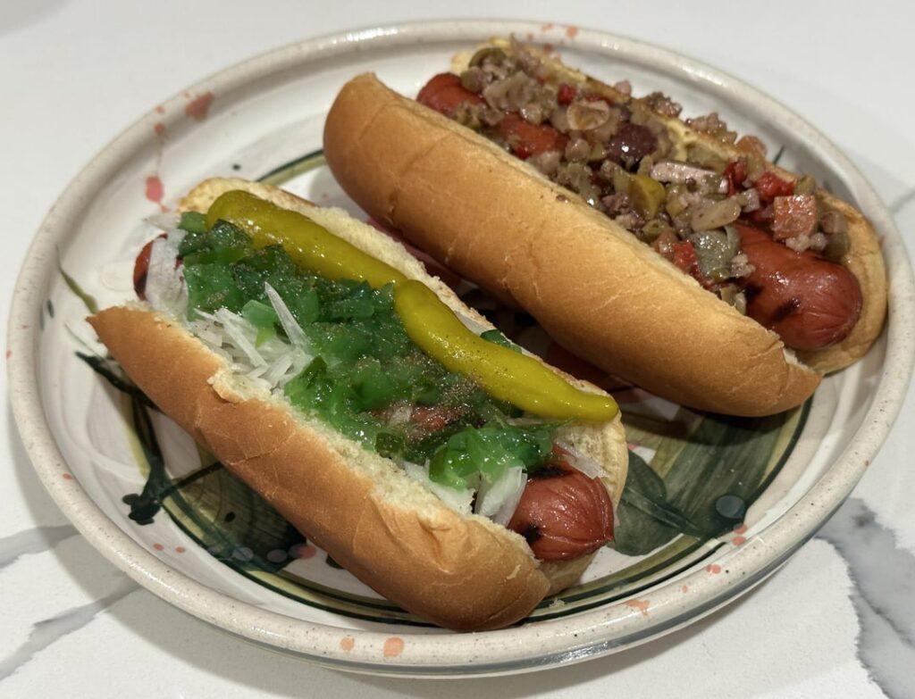 some dogs: 1)yellow mustard, onion, relish, sport pepper, celery salt. 2)dijon and muffuletta mix.