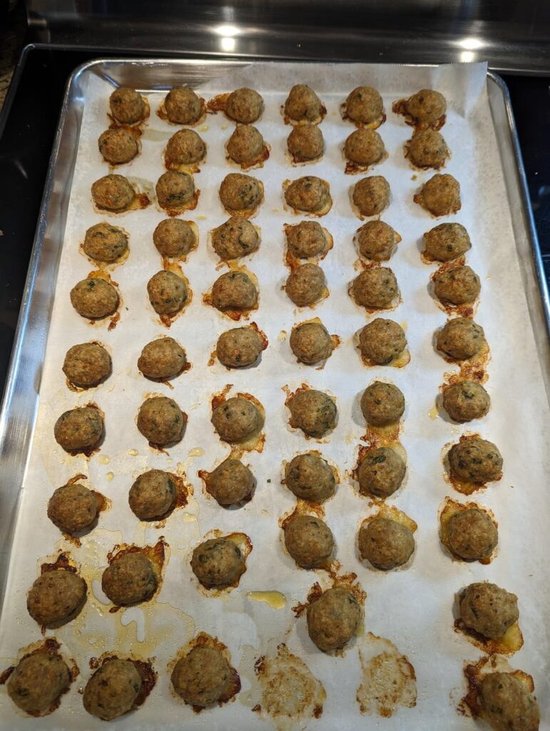 Chicken balls, rolled out so many and weighed all to the same weight, all good for freezing to eat on weekdays.