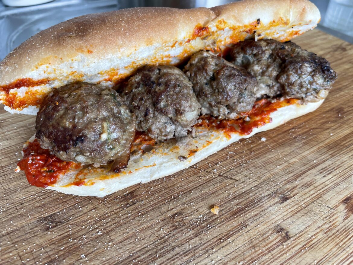 Lamb Kofta and pepper-and-tomato sauce