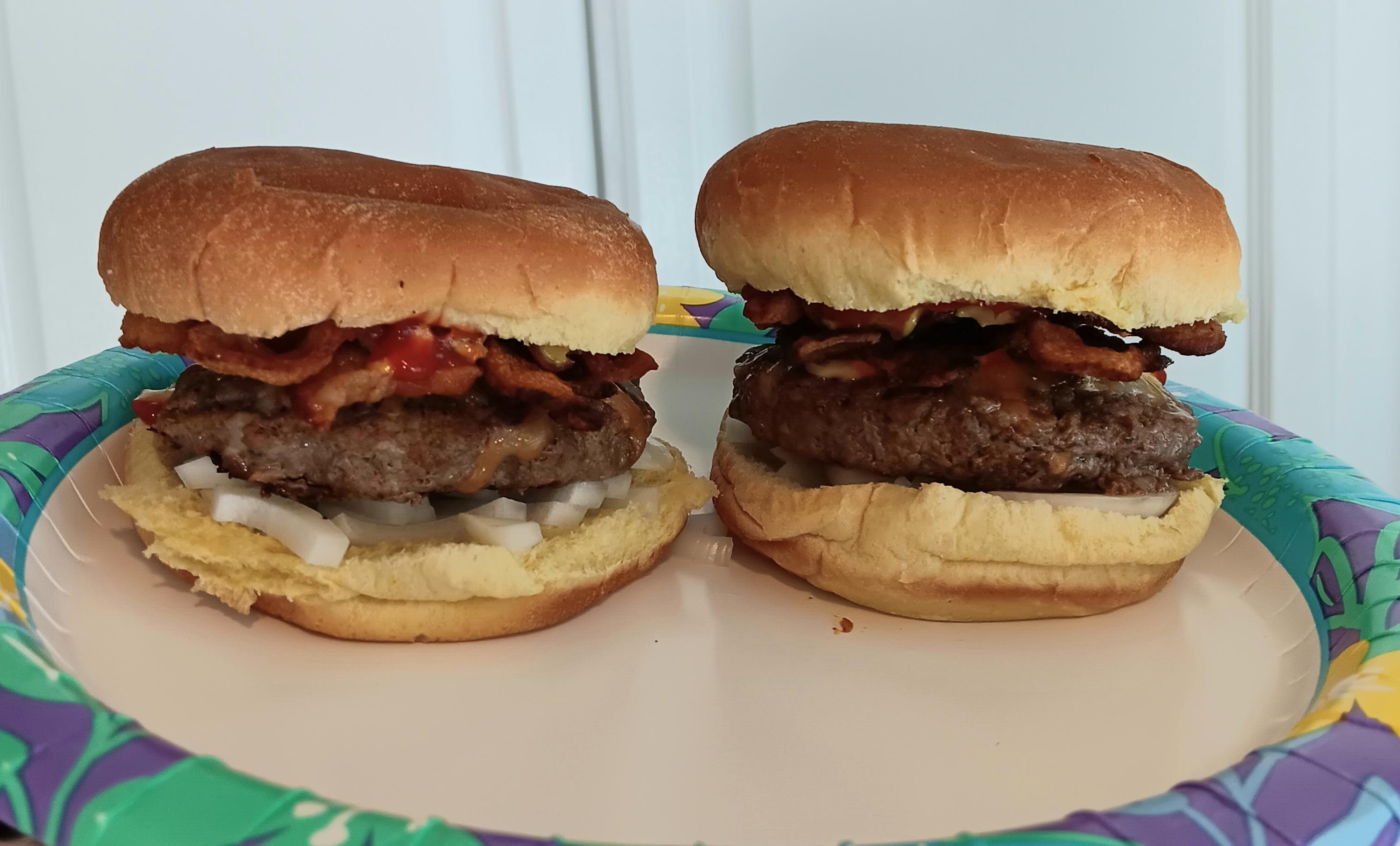 A simple bacon burger with onions, ketchup, and mustard. Dining and Cooking