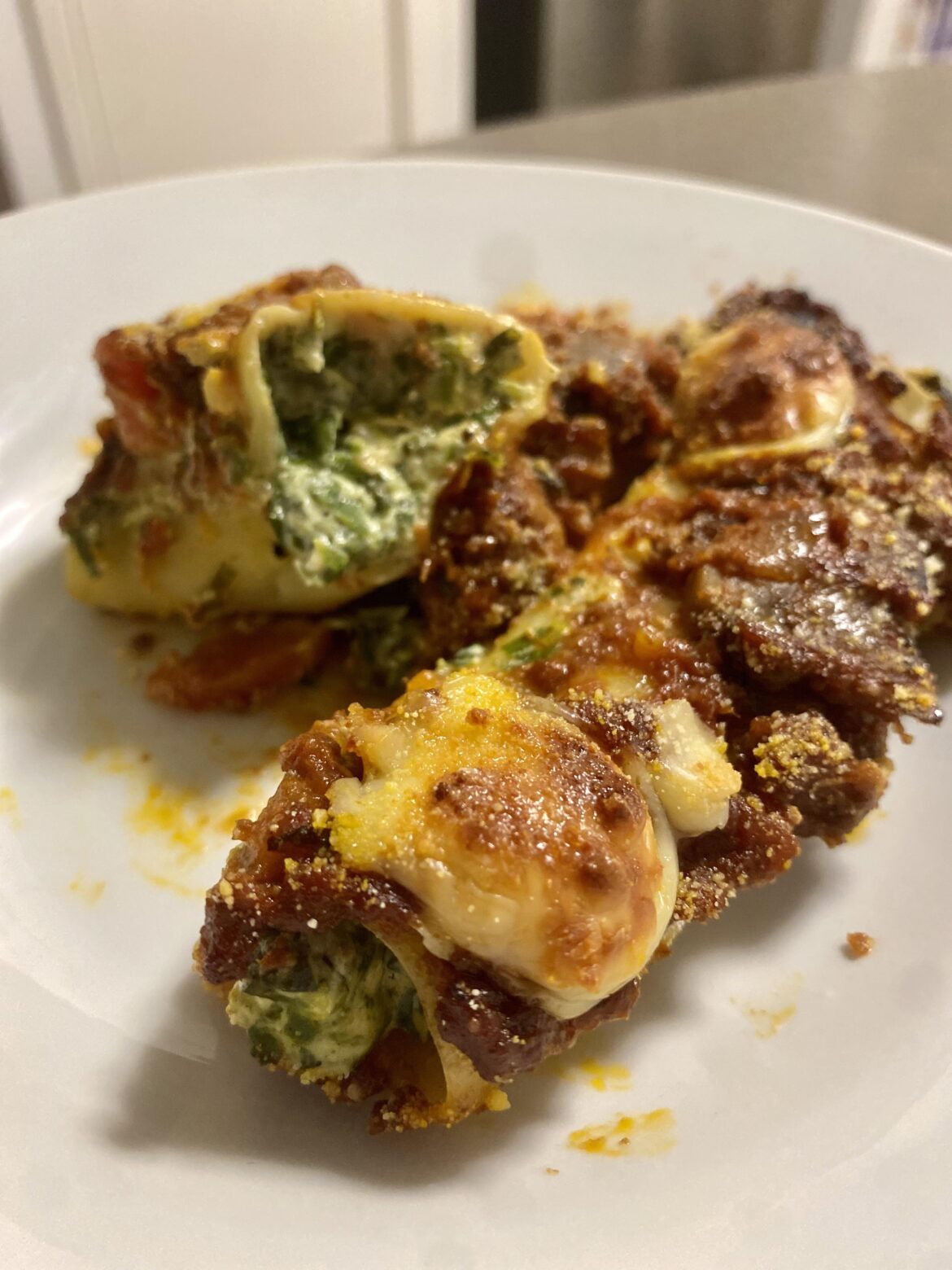 My homemade spinach and ricotta cannelloni. Three meat sauce.