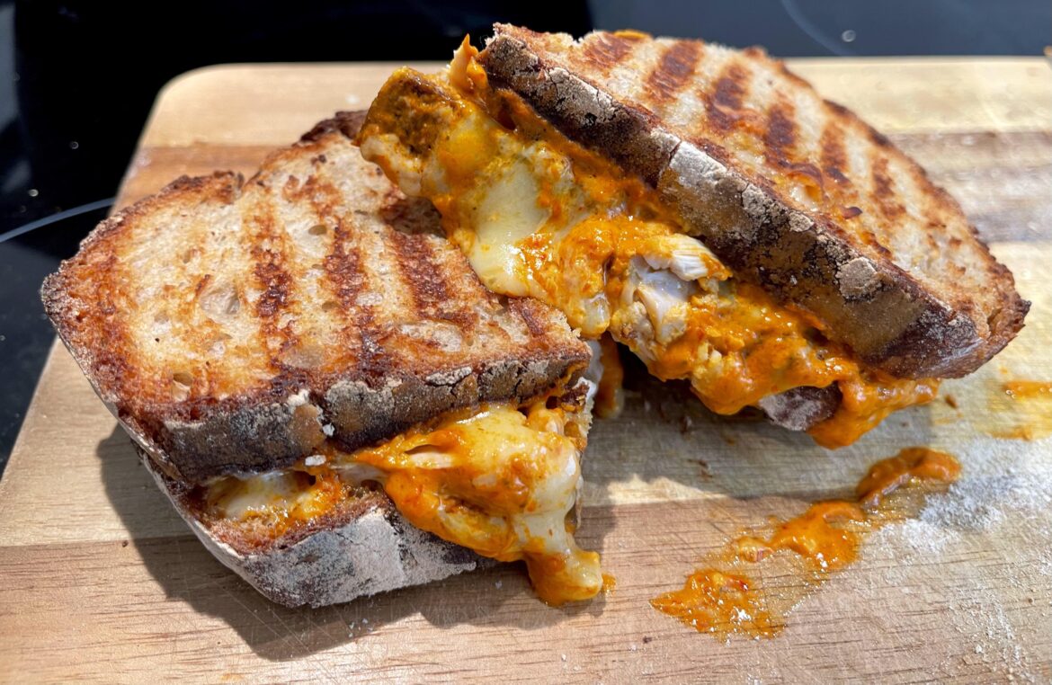 Chicken, cheddar and peri peri toastie. Homemade sourdough and sauce. I think about it a lot.