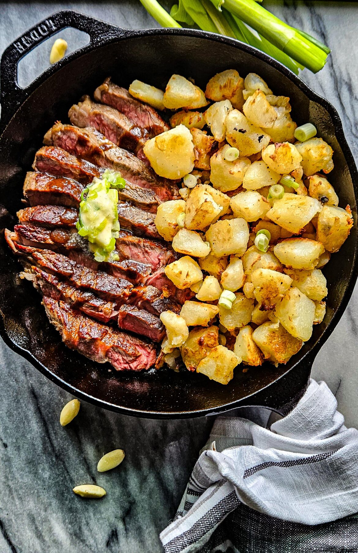 Steak and crispy taters with a scallion butter