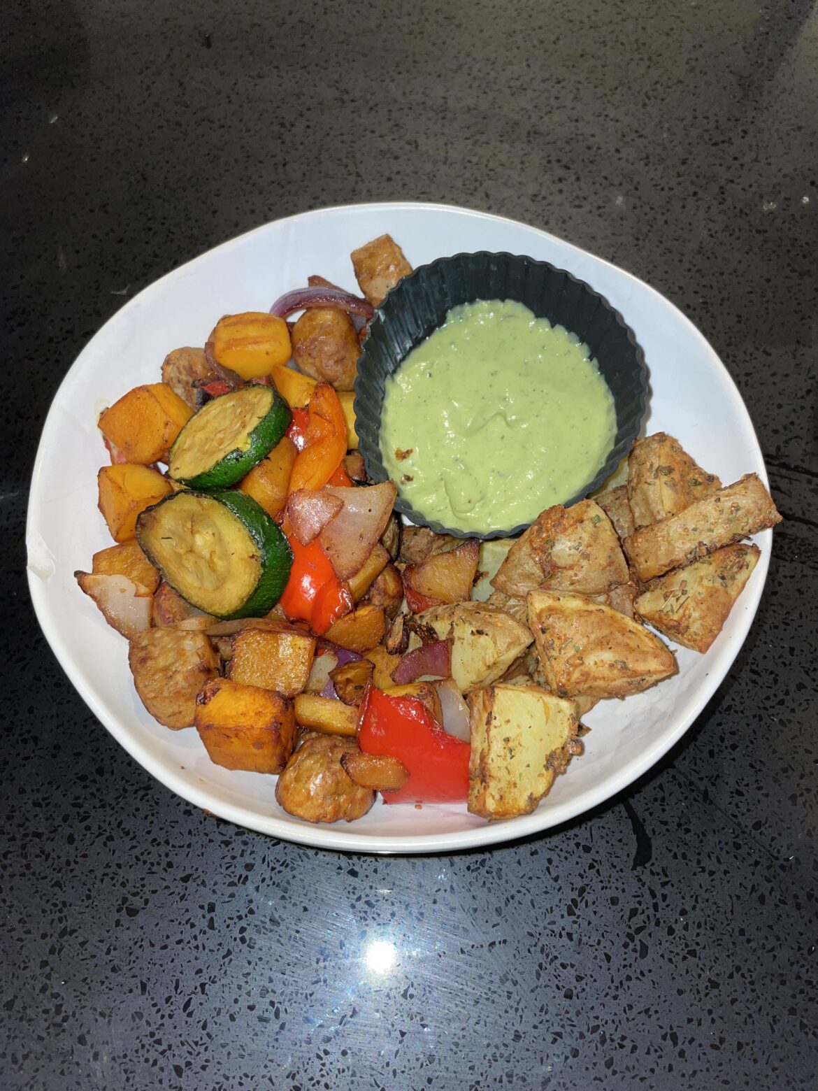 Sausages, med veg, potatoes and avo yog courgette dip