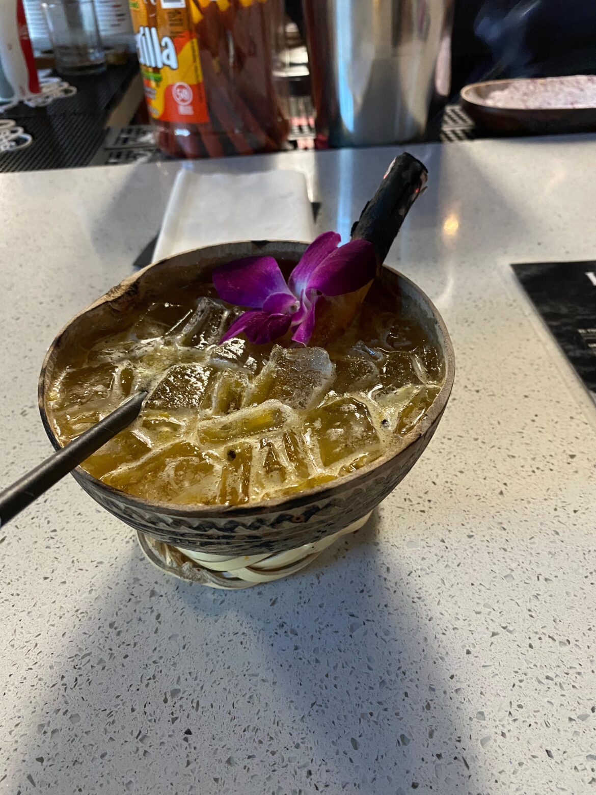 Cocktail in a flimsy wooden…bowl…