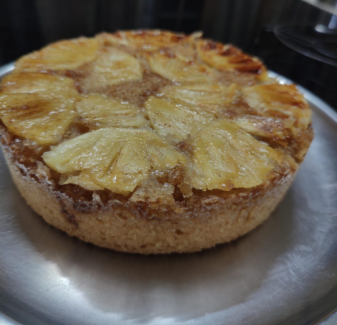 Upside down pineapple cake with coconut sponge