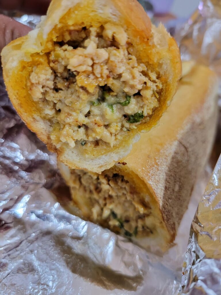 Indian-style spicy chicken cheesesteak and masala fries