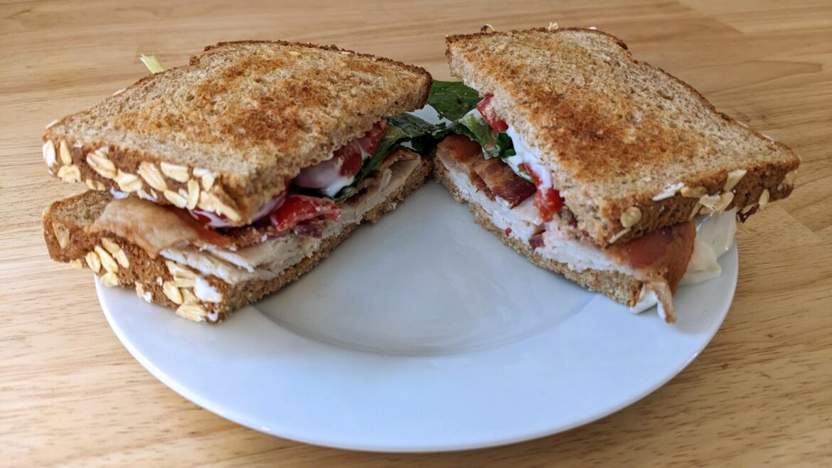 Today's depression sandwich: turkey, bacon, ranch, lettuce and seasoned tomatoes on toasted wheat
