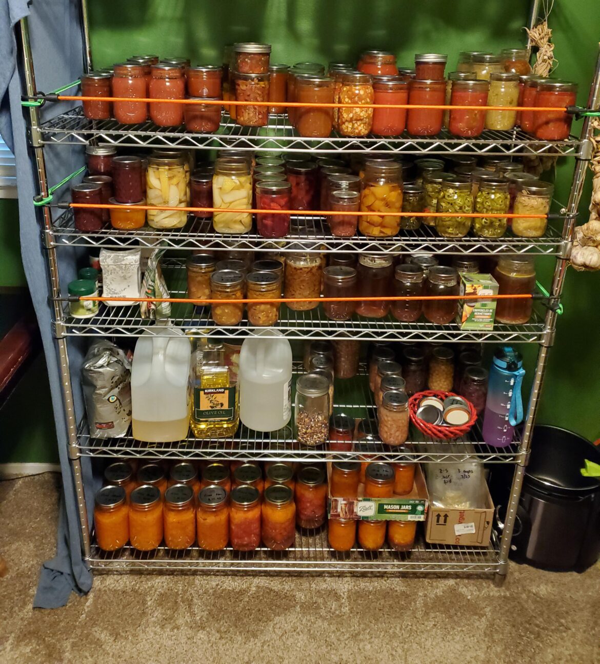 2nd year of canning went well! 208 jars on the shelves, 30 in the freezer, 40 in the fridge and more stuff dehydrated