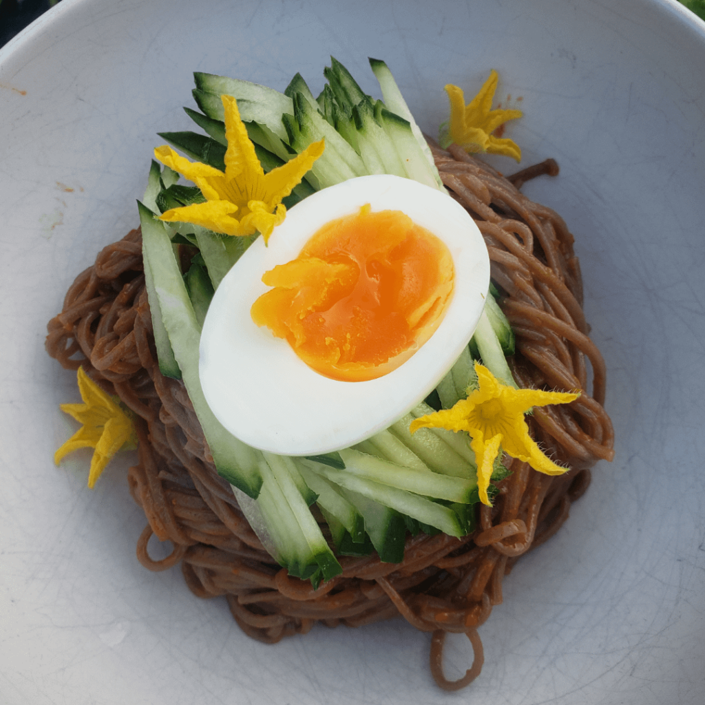 Spicy buckwheat noodles with homegrown cucumbers and cucumber flowers 🥒🌼