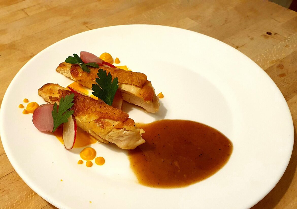 Brined chicken breast with carrot puree, radishes & pan sauce
