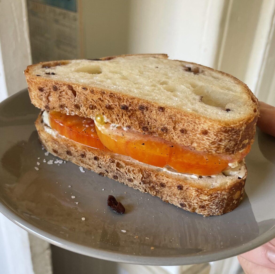 Simplicity - classic tomato sandwich on olive sourdough with homemade mayo.