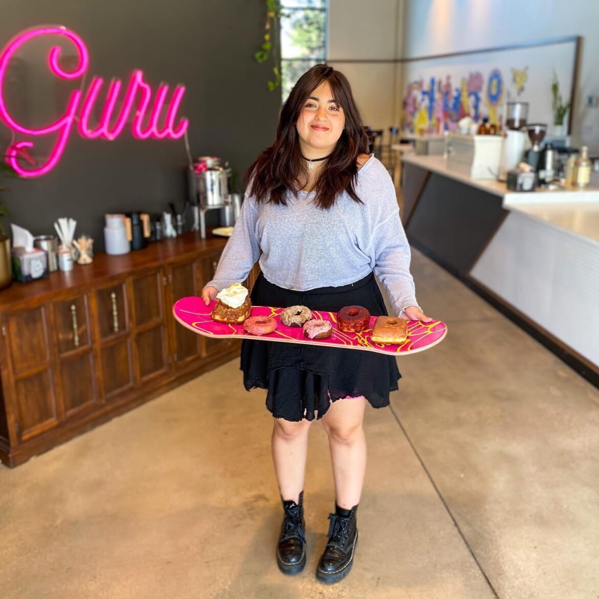 Donuts on a skateboard.