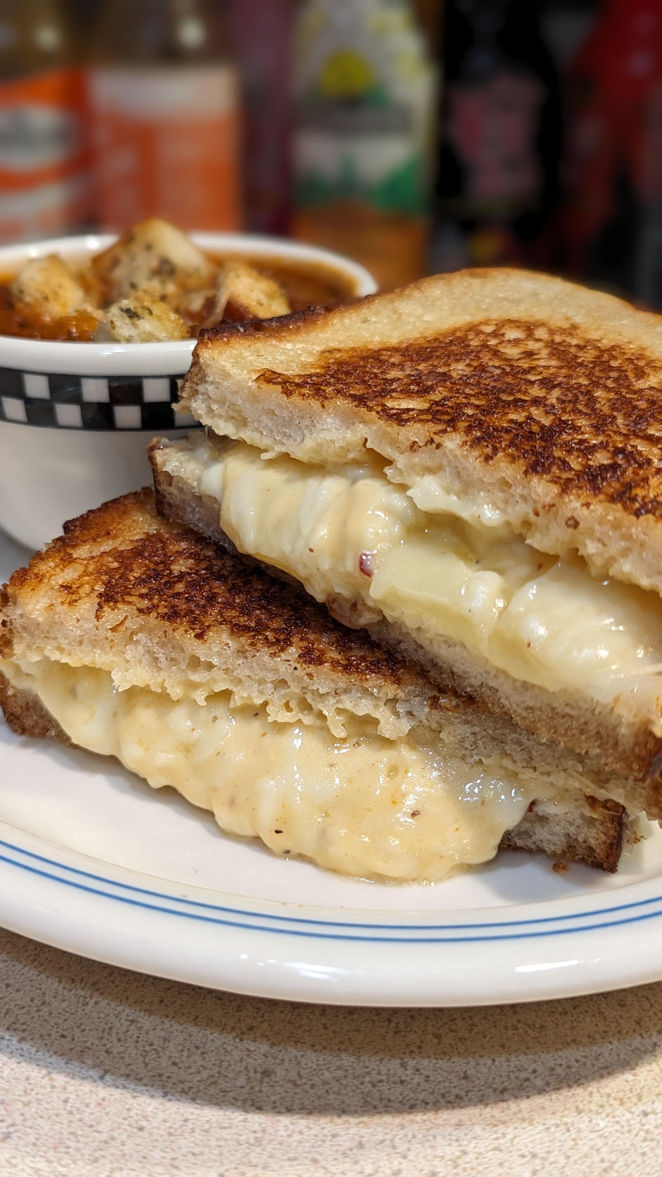 Queso, muenster, provolone, & mozzarella on soudough Dining and Cooking