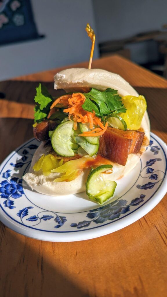 Woon, Silverlake - Mama Fong's 5 Spice Chicken Wings ($10), Beef Noodles ($15), Pork Belly Bao ($7), Lucky Cat ($7)