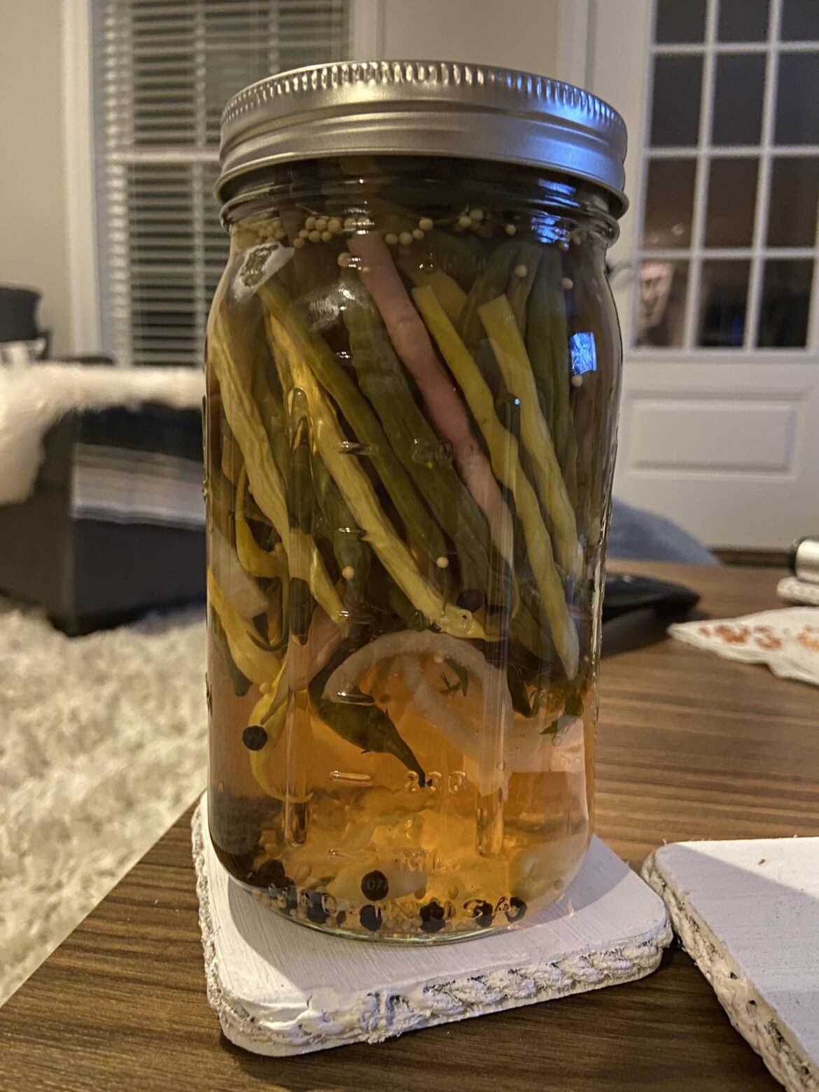 Is it ok for pickled string beans to float in the jar? Is it ok for pickled string beans to float in the jar?