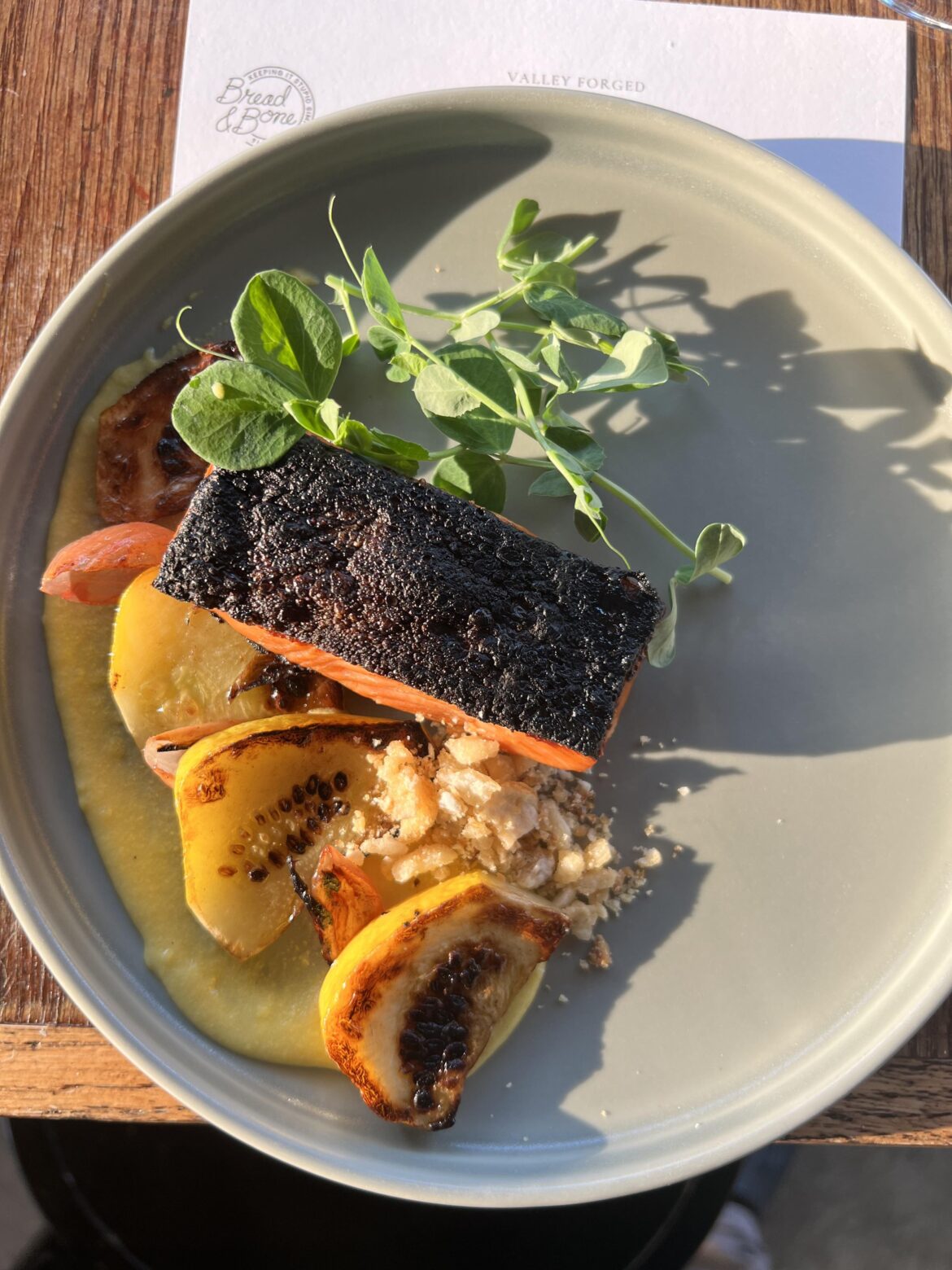 Seared steelhead, patty pan squash, corn nuts (house made), corn purée, pea sprouts