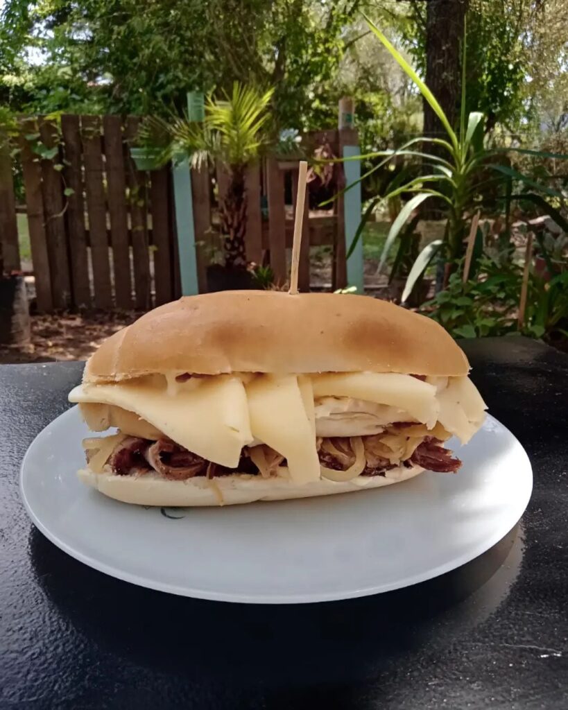 Sandwich with braised bondiola, cheese and onion caramel