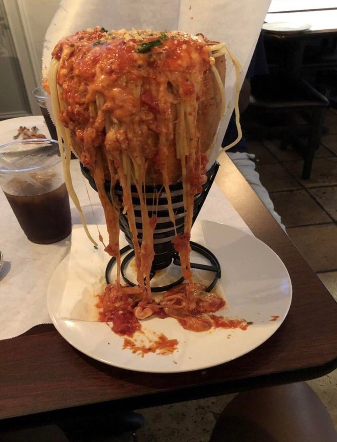 Spaghetti bolognese in a bread cone