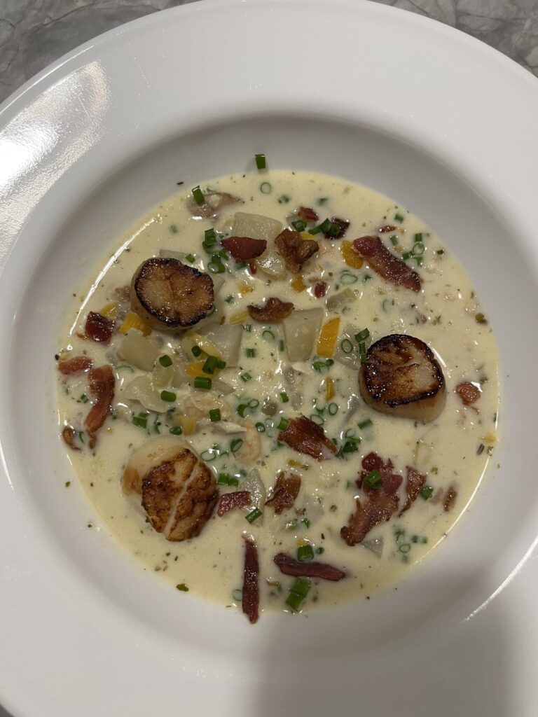 East coast seafood chowder w/pan seared scallops and homemade biscuits