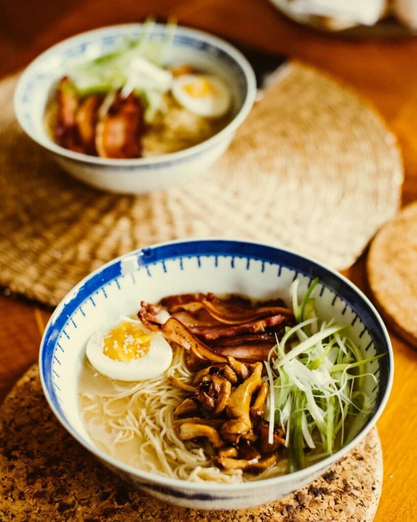 Creamy tonkotsu ramen with traditional Swedish inspired toppings like smoked pork side and chanterelle mushrooms