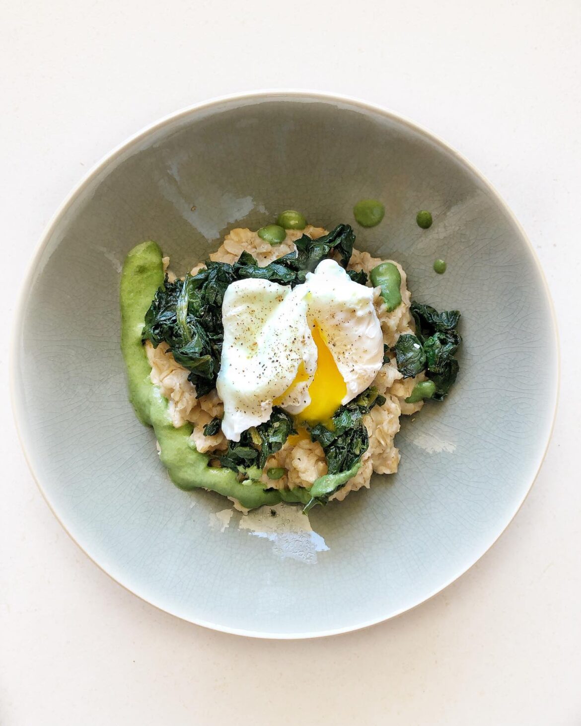 Salted oatmeal with poached egg and spinach sauce. I really like this combination for breakfast or even lunch.